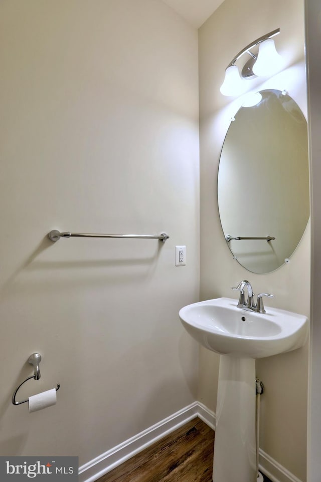 bathroom featuring hardwood / wood-style flooring