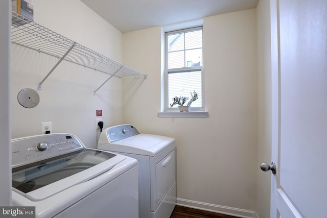 clothes washing area with washer and dryer