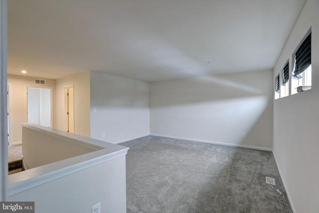 empty room featuring carpet floors