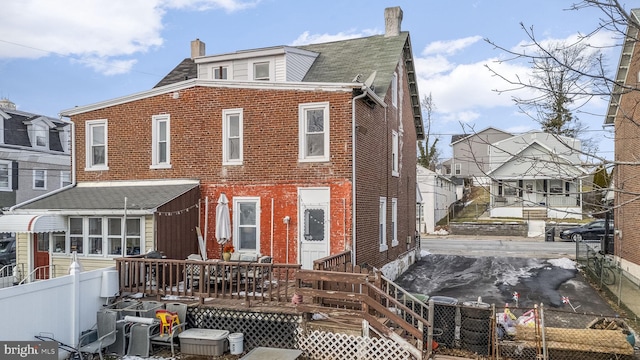 view of front facade featuring a deck