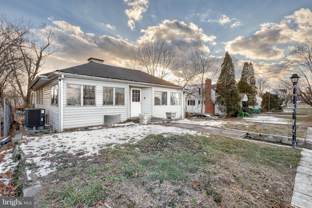 view of front of house featuring central AC unit