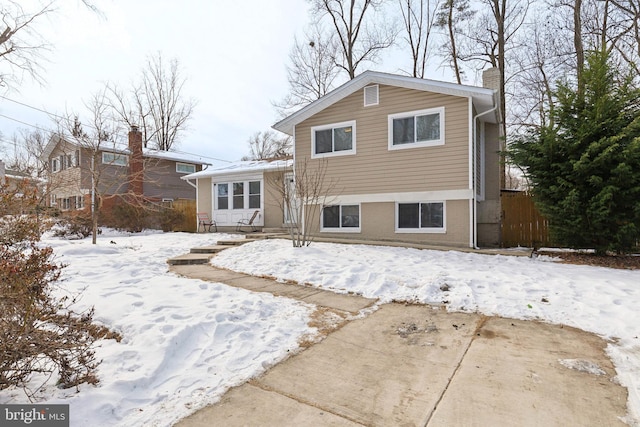 view of snow covered property