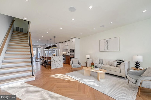 living room with light parquet flooring