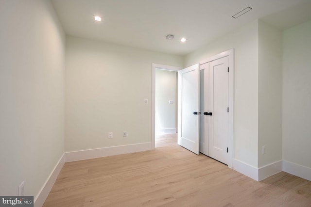 unfurnished bedroom featuring light hardwood / wood-style floors