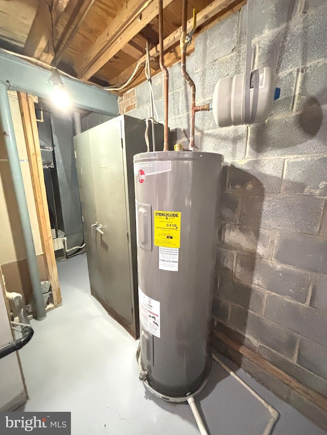 utility room featuring electric water heater