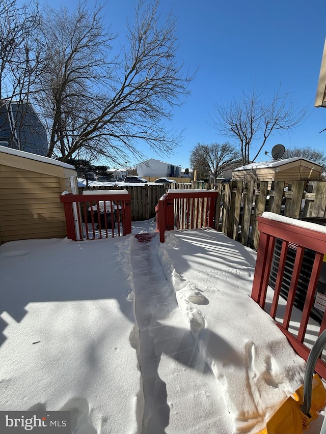 view of snow covered deck