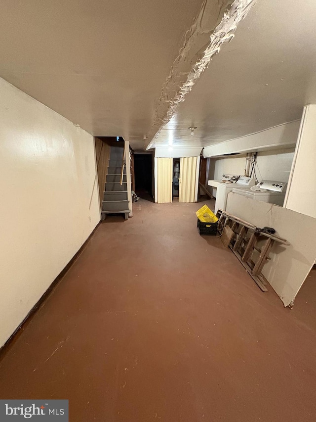 basement with separate washer and dryer