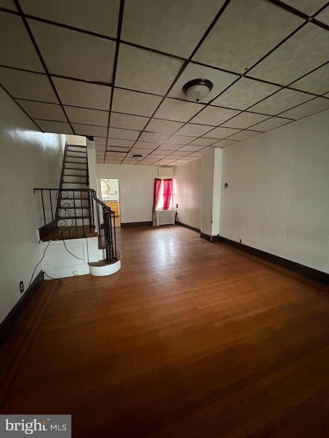 spare room with wood-type flooring