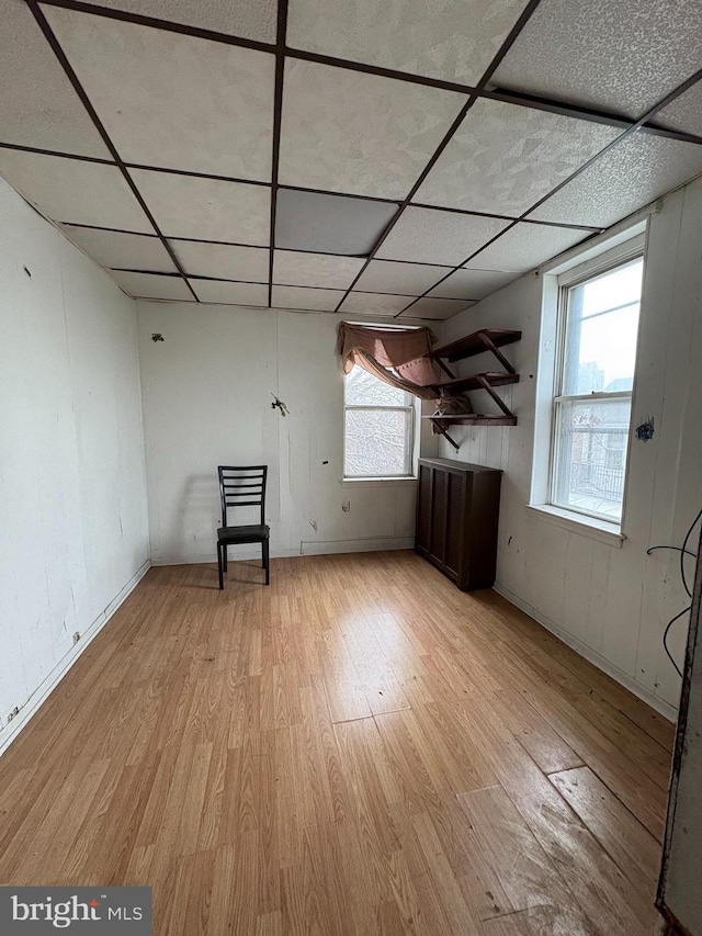 additional living space featuring light hardwood / wood-style floors