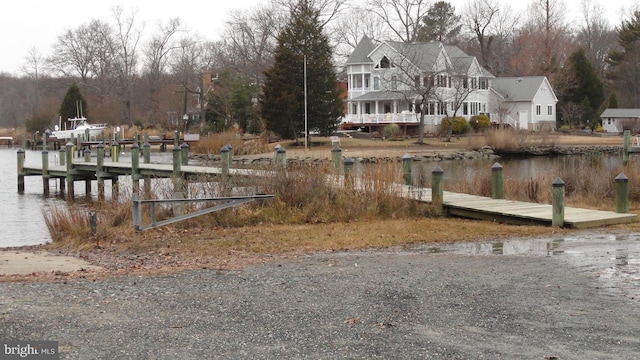 view of dock with a water view