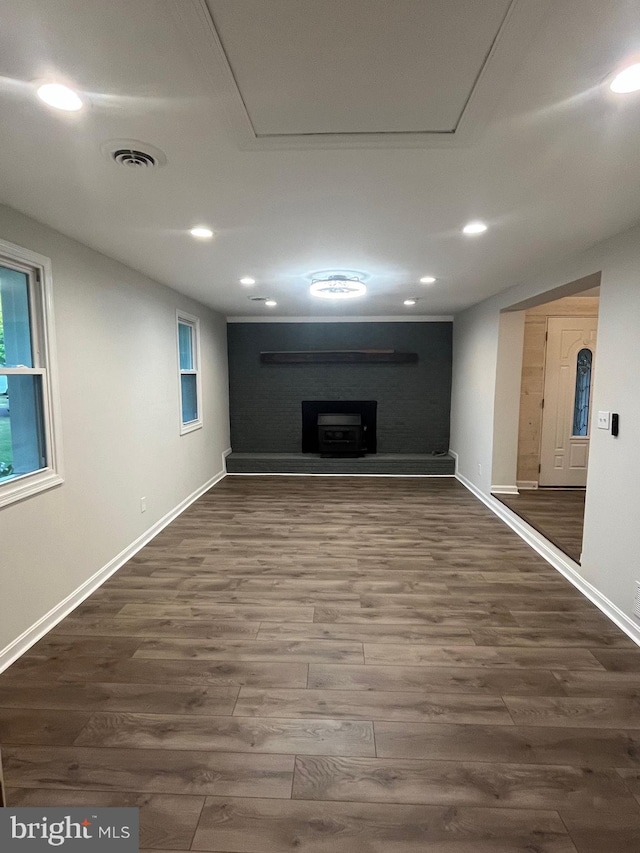 basement featuring dark wood-type flooring