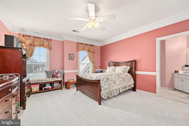 bedroom with ceiling fan, multiple windows, ornamental molding, and light carpet