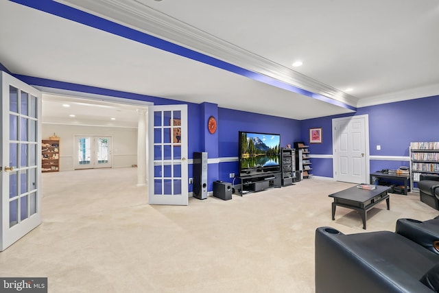 living room with ornamental molding, french doors, and carpet floors