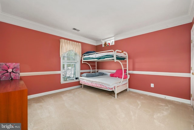 carpeted bedroom with crown molding