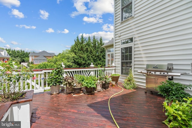 wooden deck with grilling area