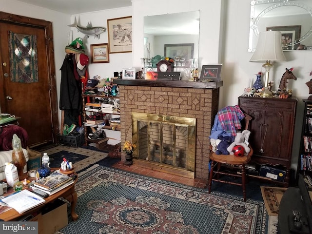 living room featuring a fireplace