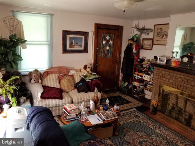 living room with hardwood / wood-style flooring and a fireplace