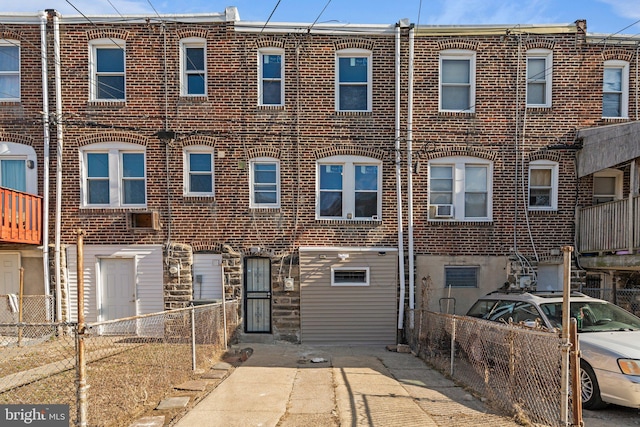 view of front facade featuring cooling unit