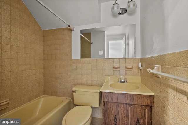 full bathroom featuring shower / bath combination, toilet, vanity, and tile walls