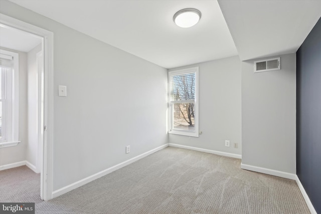 view of carpeted spare room