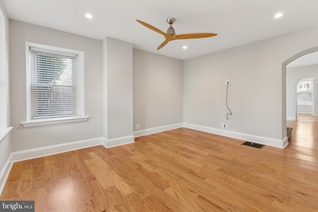 spare room featuring ceiling fan and light wood-type flooring