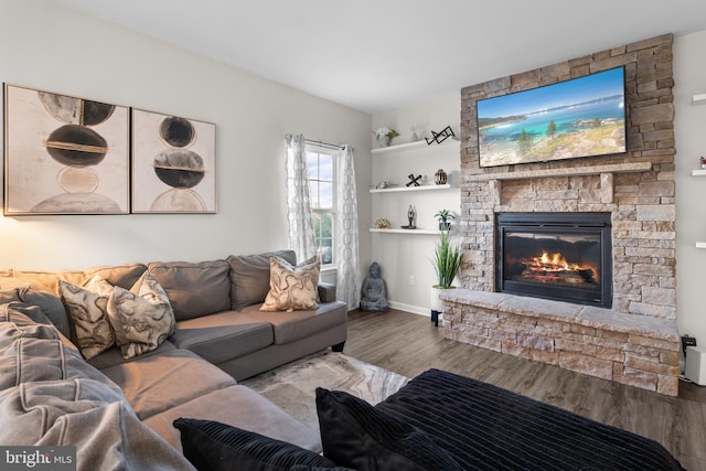 living room featuring a fireplace and hardwood / wood-style flooring