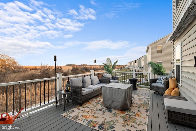 wooden deck with an outdoor hangout area