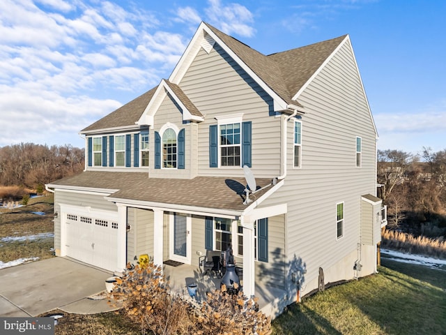 view of front of property featuring a garage