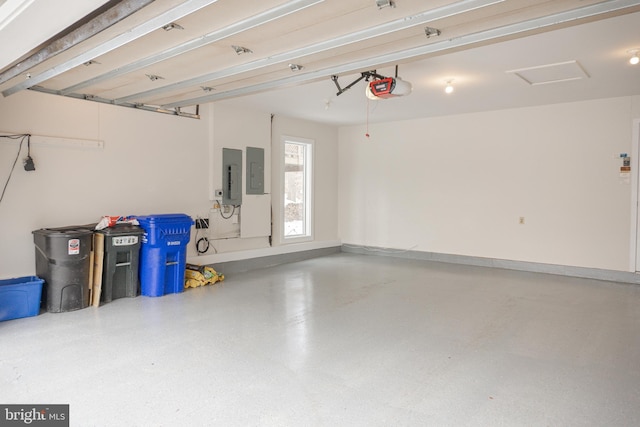 garage featuring a garage door opener, electric panel, and baseboards