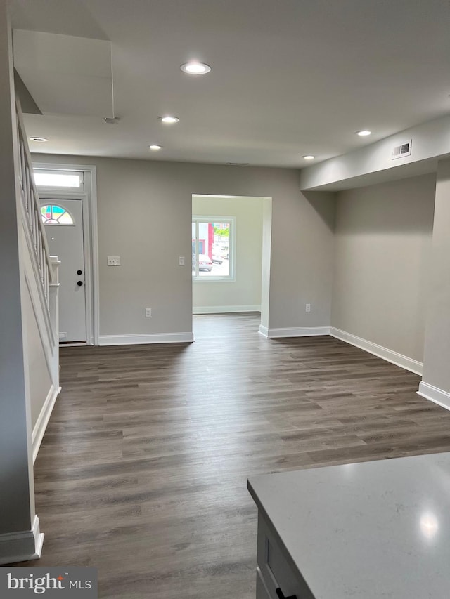 interior space featuring dark wood-type flooring