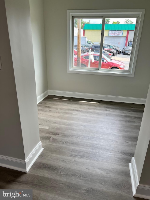 empty room featuring hardwood / wood-style flooring