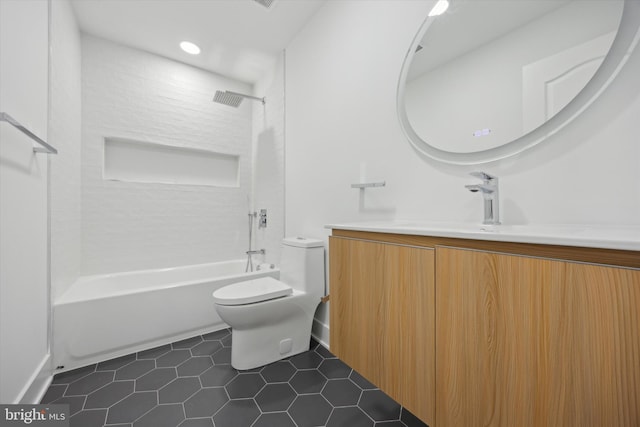 full bathroom with shower / bath combination, tile patterned flooring, vanity, and toilet