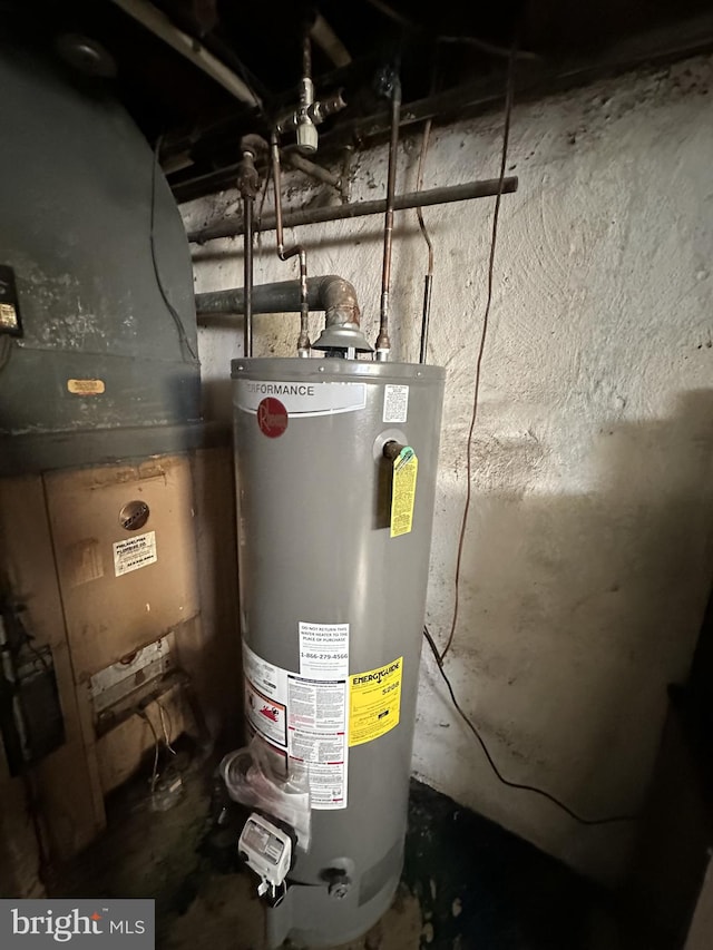 utility room with water heater