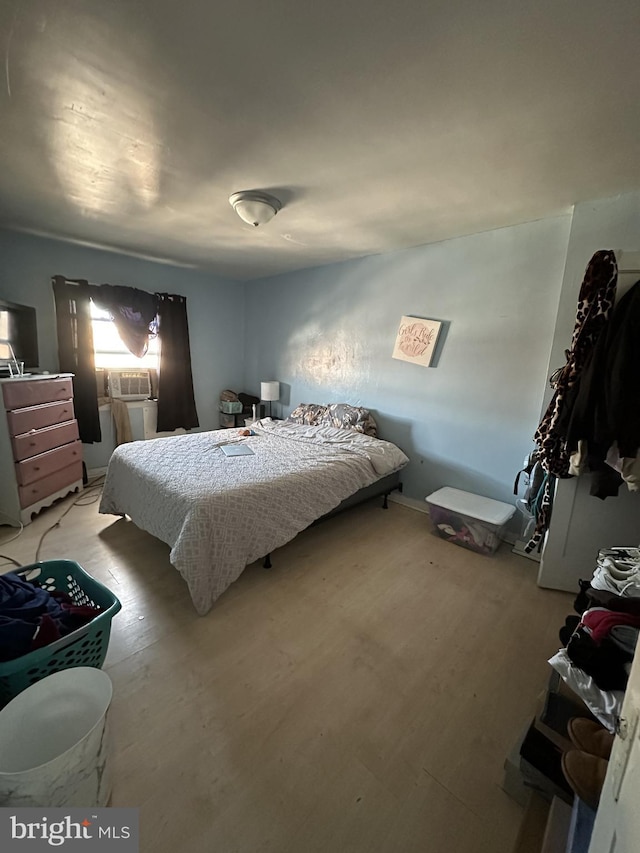 bedroom featuring light wood-type flooring