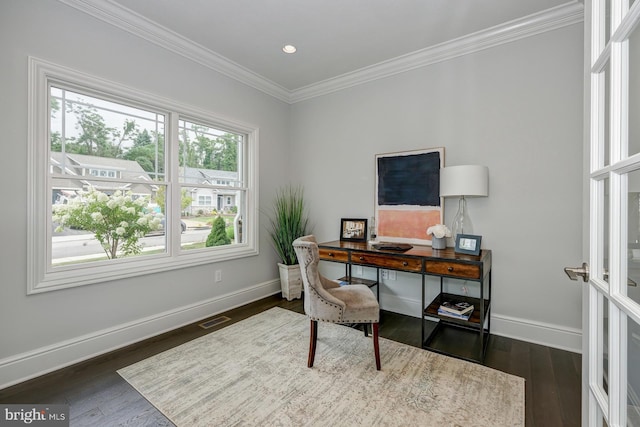 home office with dark hardwood / wood-style flooring and ornamental molding