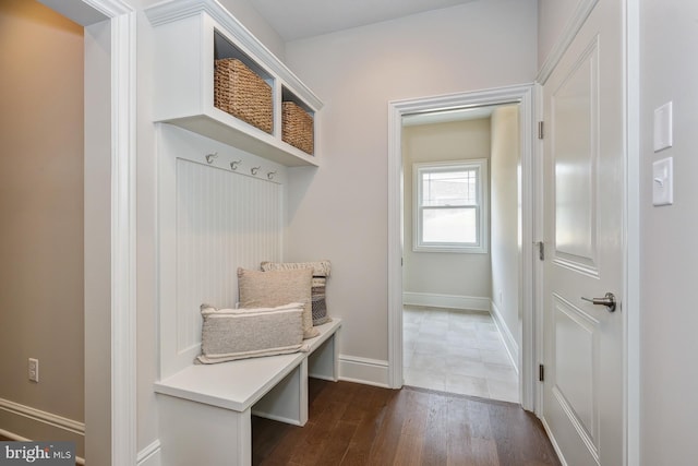 mudroom with dark hardwood / wood-style flooring