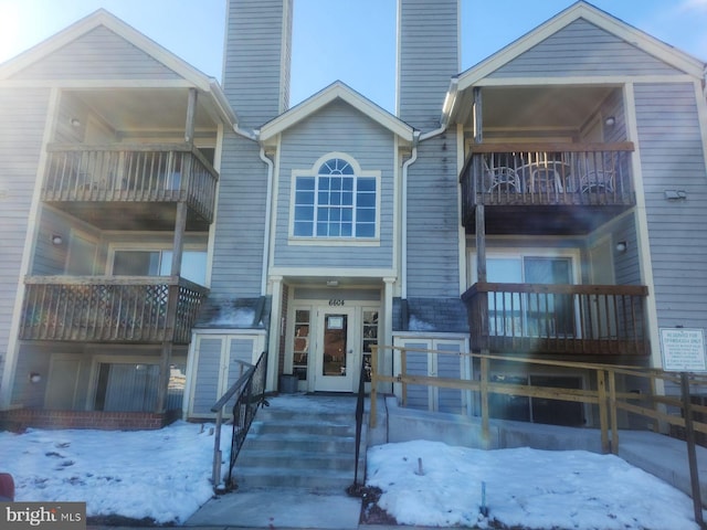 view of snow covered property