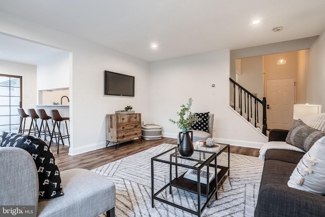 living room featuring dark hardwood / wood-style floors