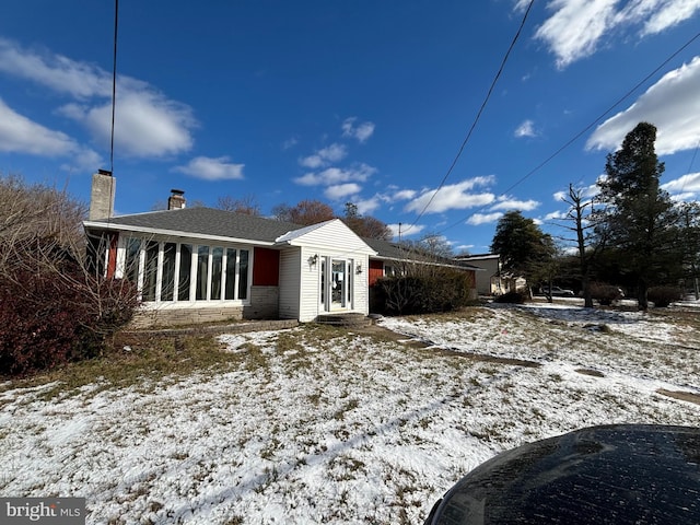 view of snow covered property