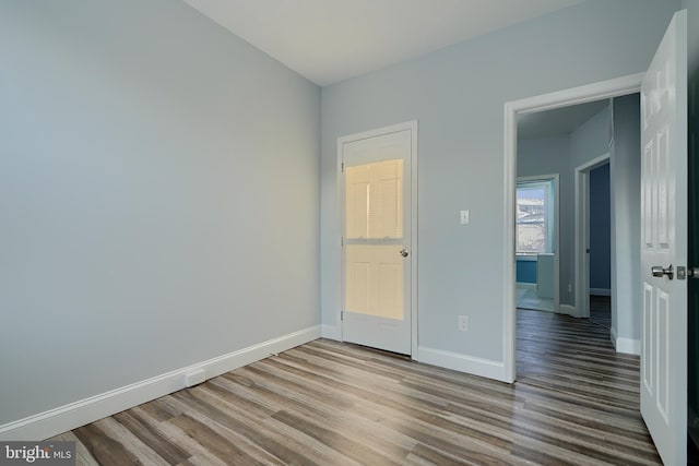 spare room with light hardwood / wood-style floors