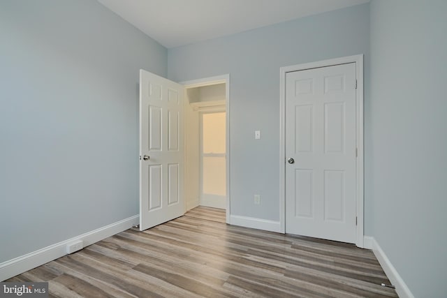 unfurnished bedroom featuring light hardwood / wood-style floors