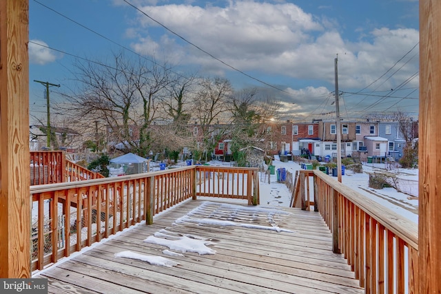 view of snow covered deck