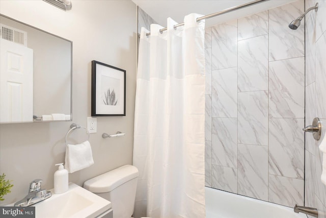 full bathroom featuring toilet, vanity, and shower / bathtub combination with curtain