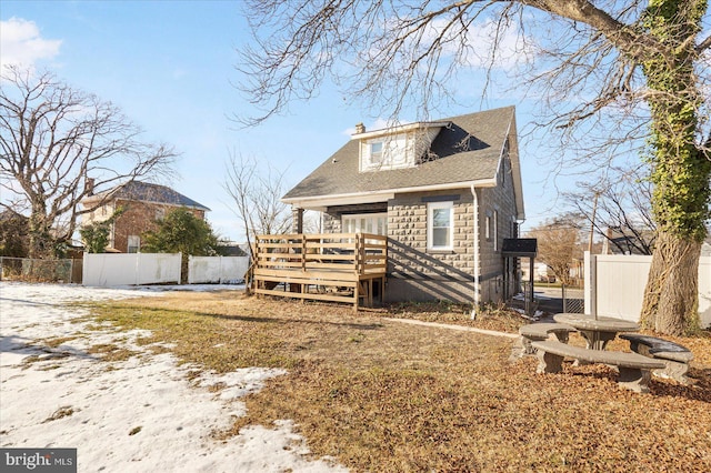 view of front of home with a deck