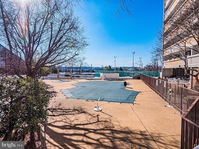 view of pool featuring a patio