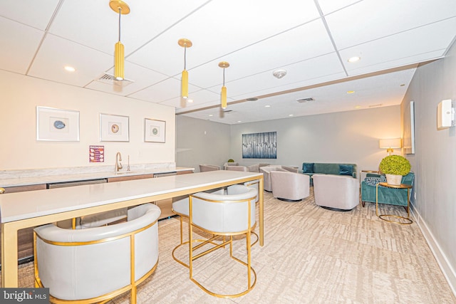 dining room featuring sink