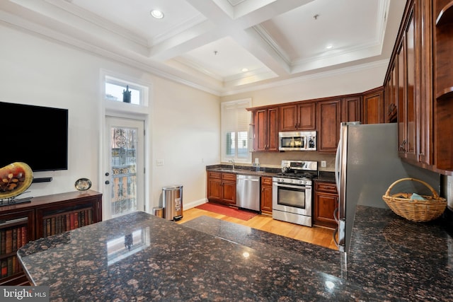 kitchen featuring beam ceiling, sink, coffered ceiling, light wood-type flooring, and stainless steel appliances