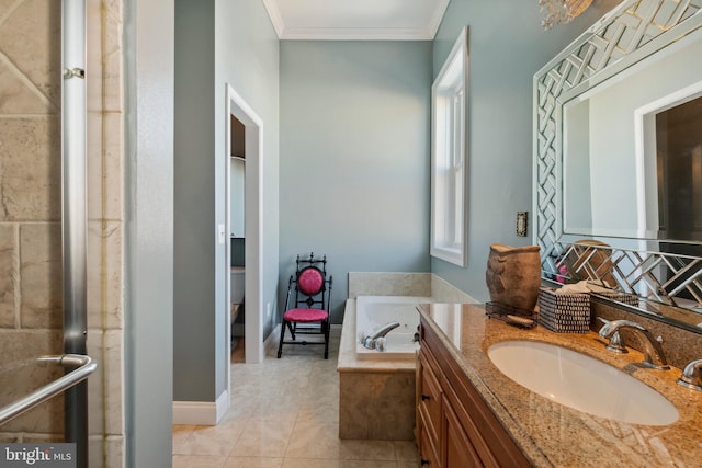 bathroom featuring tile patterned floors, vanity, toilet, a relaxing tiled tub, and crown molding