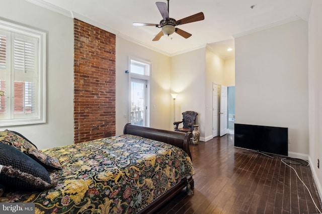 bedroom featuring ceiling fan, dark hardwood / wood-style flooring, and crown molding