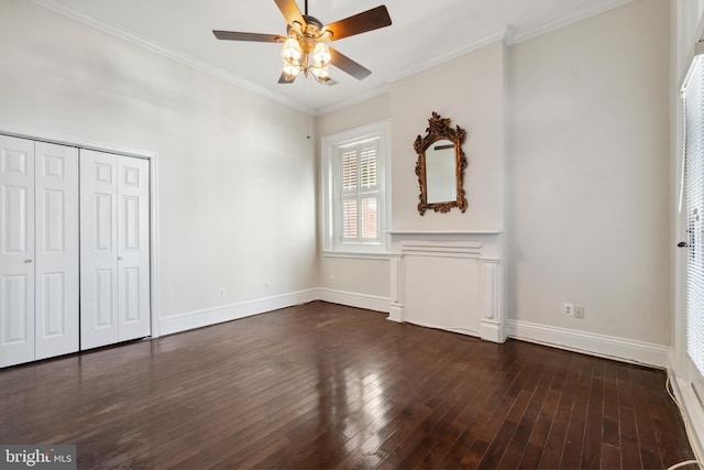 unfurnished bedroom with ceiling fan, ornamental molding, a closet, and dark hardwood / wood-style flooring